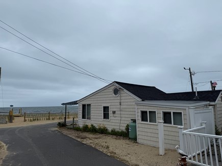 Dennis, Chases Ocean Grove Cape Cod vacation rental - Parking spot on this  side of cottage for one car