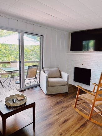 Truro Cape Cod vacation rental - Living room includes a smart TV & sliding door to the deck.