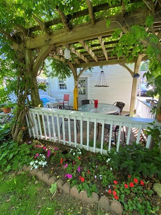 Sandwich Village Cape Cod vacation rental - Wisteria pergola shaded patio