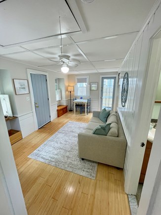 Dennisport Cape Cod vacation rental - Cozy living space featuring a full-size pull-out couch