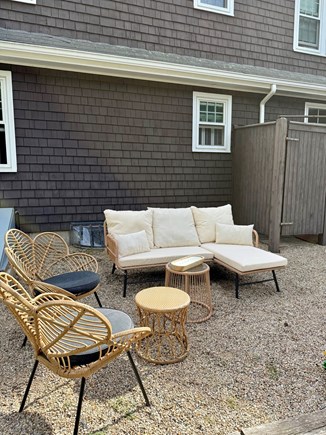 Mashpee Cape Cod vacation rental - Outdoor seating area near fire pit and outdoor shower