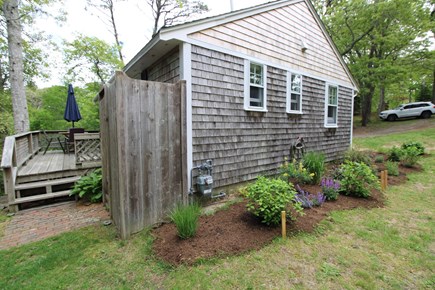 Eastham Cape Cod vacation rental - Back of House Showing Deck Access and Outdoor Shower