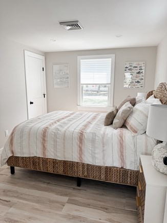 South Yarmouth Cape Cod vacation rental - Queen bedroom 1, 2 side tables and closet.