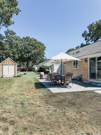 South Yarmouth Cape Cod vacation rental - Backyard-shed and lots of yard space.   Outdoor shower and grill.