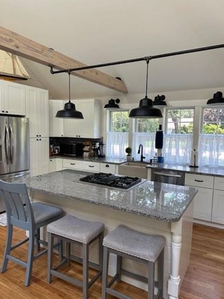 Harwich Cape Cod vacation rental - Gather around the granite island and plan your day over coffee