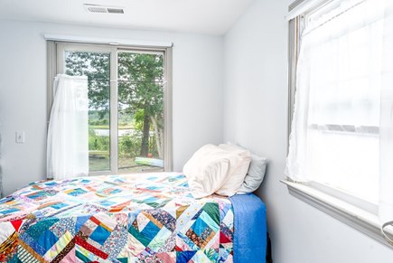 Dennis Cape Cod vacation rental - First bedroom with a river view window.