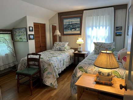 Eastham Cape Cod vacation rental - Comfy 2nd bedroom has twin beds, window AC, and floor fan