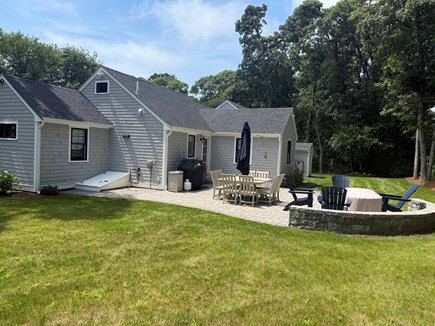 Harwichport Cape Cod vacation rental - Large backyard with patio and outdoor shower