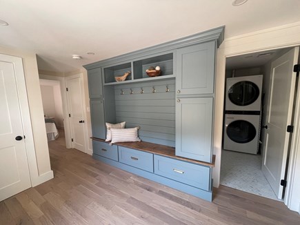 Harwichport Cape Cod vacation rental - Mudroom entry with coat closet and built in bench/storage