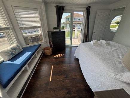 West Yarmouth Cape Cod vacation rental - 2nd floor queen bed Monomoy Light, bay window & slider to balcony