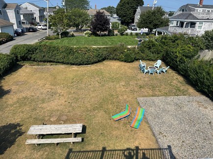 West Yarmouth Cape Cod vacation rental - Play yard w/ table fire pit, beach chairs, lounge chairs  parking
