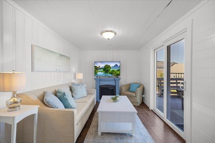 West Yarmouth Cape Cod vacation rental - 2nd floor - Living room area w/ sliders to a deck.