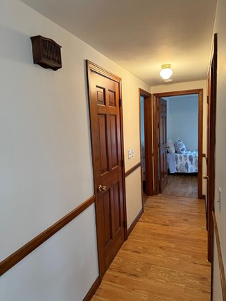 Eastham Cape Cod vacation rental - Hallway leads to bathroom & bedrooms