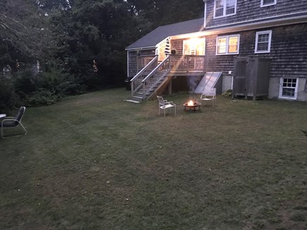 Falmouth Cape Cod vacation rental - Back yard with fire pit