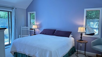 New Seabury Cape Cod vacation rental - Master bedroom with sliders that open to the patio.