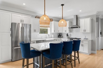 Dennis Cape Cod vacation rental - Open living room, dining area, and kitchen. Perfect for gathering