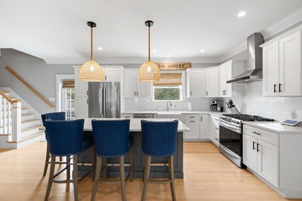 Dennis Cape Cod vacation rental - Open living room, dining area, and kitchen. Perfect for gathering