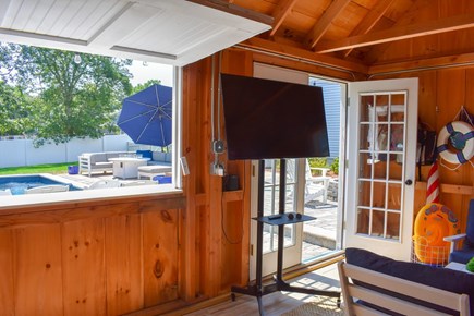 Dennis Cape Cod vacation rental - Pool house!  Complete with beverage fridge, TV, and fan!