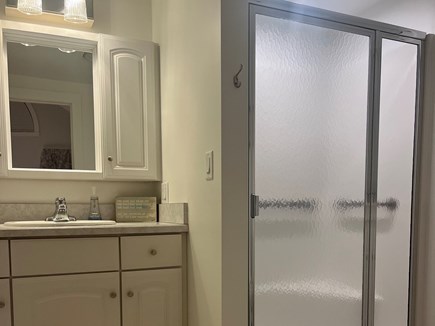 Falmouth Heights Cape Cod vacation rental - Master bathroom with stocked linen closet