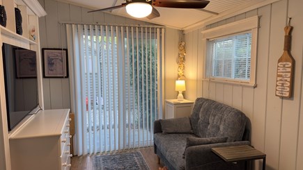 Dennis, Salt Air Village Cape Cod vacation rental - Bedroom with full size bed, soda, & TV