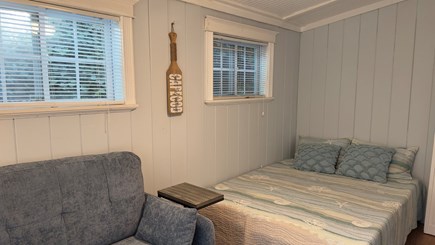 Dennis, Salt Air Village Cape Cod vacation rental - Bedroom with Full size bed, sofa, & TV