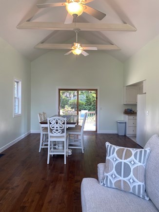 Pocasset Cape Cod vacation rental - Open concept living and dining areas facing the back yard.