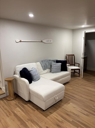Falmouth Cape Cod vacation rental - Back living- couch converts to bed