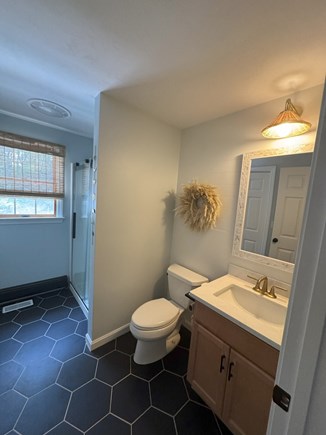 Orleans Cape Cod vacation rental - Updated coastal bathrooms with convienent first-floor laundry