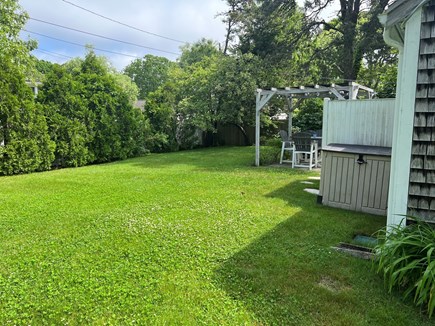 West Harwich Cape Cod vacation rental - Backyard with patio, firepit, outdoor shower
