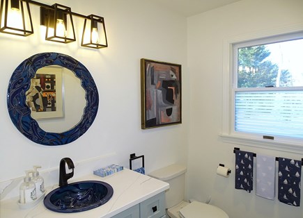 Eastham--Bayside Cape Cod vacation rental - Local artist featured in first floor bathroom 