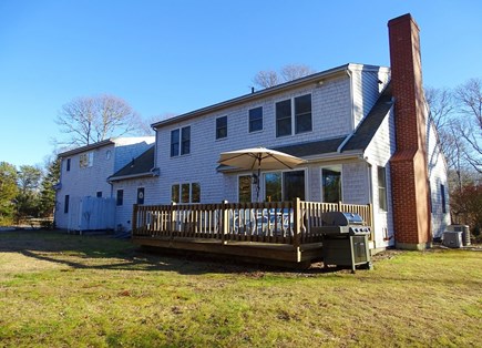 Eastham--Bayside Cape Cod vacation rental - Back yard offers privacy - enjoy evenings on the deck with grill