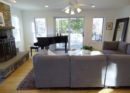 Eastham--Bayside Cape Cod vacation rental - Family room with large sectional, opens to kitchen