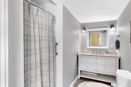 Harwich Cape Cod vacation rental - Bright and stylish bathroom featuring a walk-in shower,