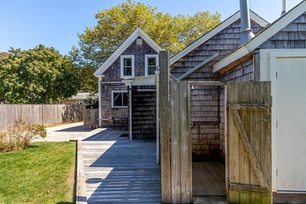 Harwich Cape Cod vacation rental - Backyard oasis featuring an outdoor shower, perfect for families