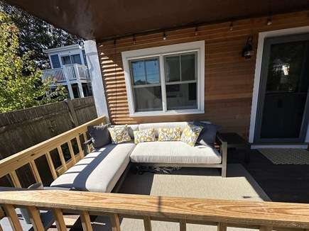 Provincetown Cape Cod vacation rental - Outdoor couch; rooftop above covered for rain protection
