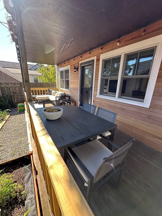 Provincetown Cape Cod vacation rental - Outdoor dining with 4 chairs; rooftop covered