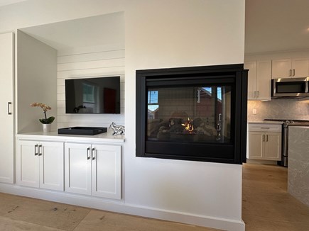 Provincetown Cape Cod vacation rental - Two sided working fireplace with remote; can vent heat into unit