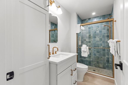Wellfleet Cape Cod vacation rental - Ensuite bathroom with walk-in shower and fresh seaside touches.