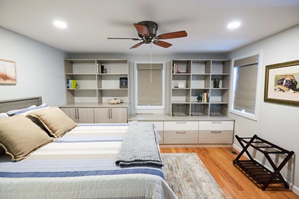 Harwich Cape Cod vacation rental - First floor bedroom has a queen size bed and plenty of storage.