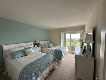 West Harwich Cape Cod vacation rental - Second bedroom with two double beds and direct access to deck