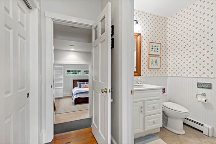 Orleans, Rocky Point Retreat Cape Cod vacation rental - Down the hall from the kitchen is a full bathroom and bedroom