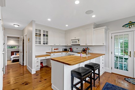 Orleans, Rocky Point Retreat Cape Cod vacation rental - Two stools at the eat-in kitchen counter create a casual space