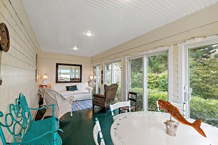 Orleans, Rocky Point Retreat Cape Cod vacation rental - A wall of sliding glass doors fills the porch with natural light