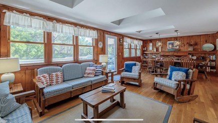 Wellfleet, Indian Neck Neighborhood  Cape Cod vacation rental - Open living/dining room with A/C splits, opens out to deck.