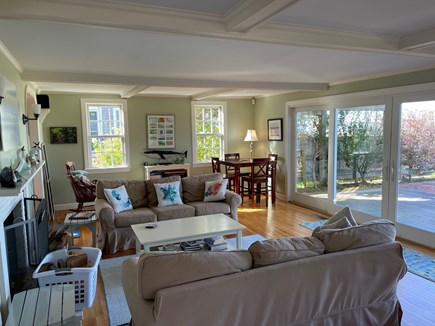Barnstable Cape Cod vacation rental - Back sitting room with fireplace