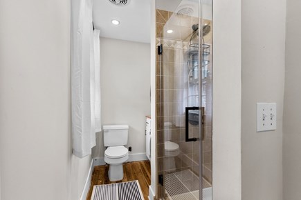 Provincetown Cape Cod vacation rental - The sleek bathroom includes a walk-in glass shower