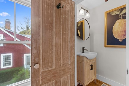 Provincetown Cape Cod vacation rental - Main-level full bath offers a stylish vanity and modern fixtures