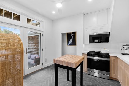 Provincetown Cape Cod vacation rental - French doors off the kitchen open to a private deck