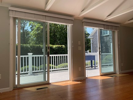 Harwich Port Cape Cod vacation rental - First floor spacious bedroom with king bed and sliders to deck