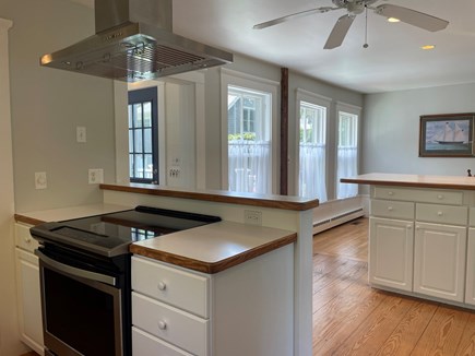 Harwich Port Cape Cod vacation rental - Fully equipped kitchen opens to dining area
